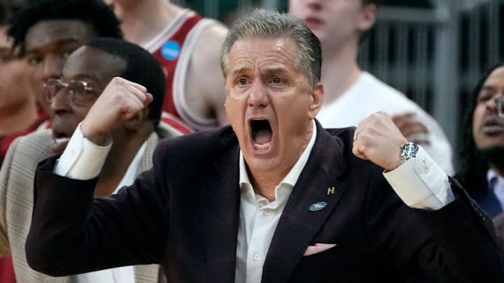 Arkansas Razorbacks coach John Calipari egging his players on against the Kansas Jayhawks in the first round of the NCAA tournament.
