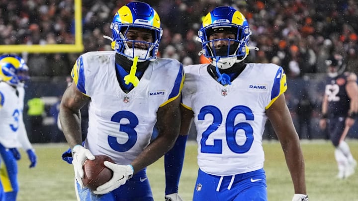Los Angeles Rams safety Kam Curl (3) celebrates with safety Kamren Kinchens (26) after intercepting a pass intended for Chicago Bears wide receiver DJ Moore (not pictured) during overtime of an NFC Divisional Round game at Soldier Field.