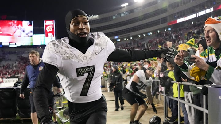Nov 16, 2024; Madison, Wisconsin, USA;  Oregon Ducks wide receiver Evan Stewart (7) greets fans following the game against the Wisconsin Badgers at Camp Randall Stadium. Mandatory Credit: Jeff Hanisch-Imagn Images