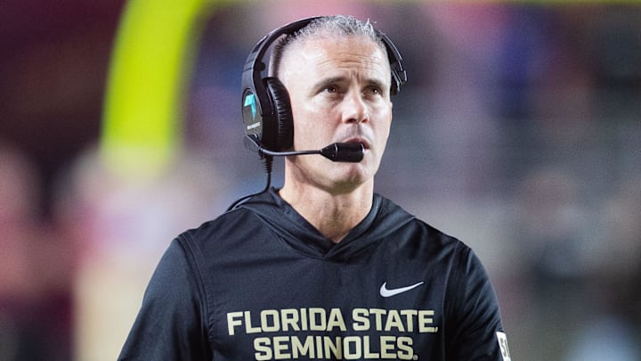 Florida State Seminoles head coach Mike Norvell walks down the field. The Miami Hurricanes lead the Florida State Seminoles 14-3 at the half on Saturday, Oct. 4, 2025.