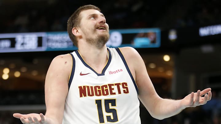 Mar 18, 2026; Memphis, Tennessee, USA; Denver Nuggets center Nikola Jokic (15) reacts during the second quarter against the Memphis Grizzlies at FedExForum. Mandatory Credit: Petre Thomas-Imagn Images Mar 18, 2026; Memphis, Tennessee, USA; Denver Nuggets center Nikola Jokic (15) reacts during the second quarter against the Memphis Grizzlies at FedExForum. Mandatory Credit: Petre Thomas-Imagn Images