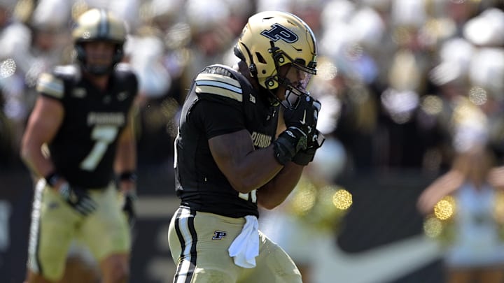 Purdue Boilermakers linebacker Mani Powell (16) celebrates a sack Purdue Boilermakers linebacker Mani Powell (16) celebrates a sack