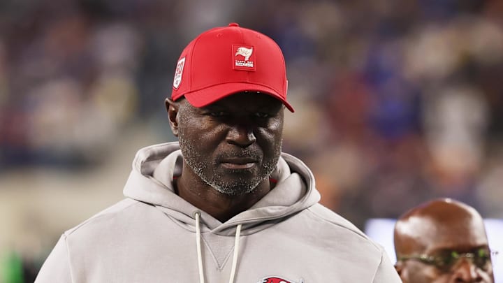 Tampa Bay Buccaneers head coach and defensive coordinator Todd Bowles walks off the field during halftime against the Los Angeles Rams