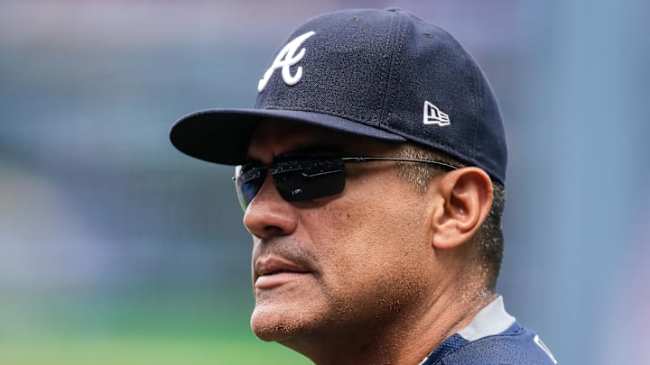 Aug 17, 2017; Denver, CO, USA; Atlanta Braves first base coach Eddie Perez (12) before the game against the Colorado Rockies at Coors Field. Mandatory Credit: Isaiah J. Downing-Imagn Images