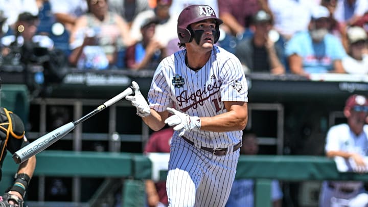 Jun 23, 2024; Omaha, NE, USA;  Texas A&M Aggies right fielder Jace Laviolette (17) hits a home run against the Tennessee Volunteers during the first inning at Charles Schwab Field Omaha. Mandatory Credit: Steven Branscombe-Imagn Images