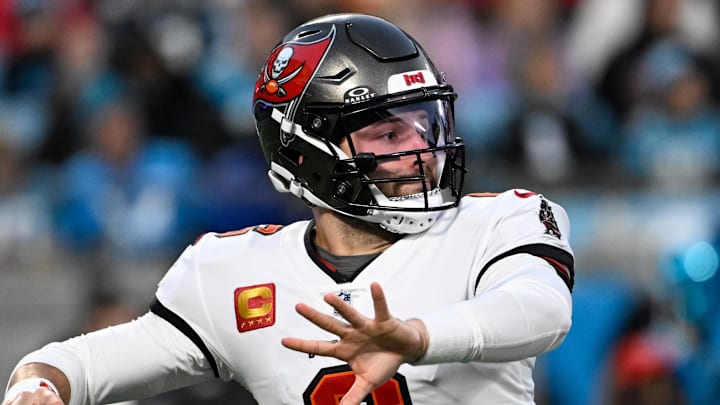 Dec 1, 2024; Charlotte, North Carolina, USA;  Tampa Bay Buccaneers quarterback Baker Mayfield (6) looks to pass in the second quarter at Bank of America Stadium. Mandatory Credit: Bob Donnan-Imagn Images