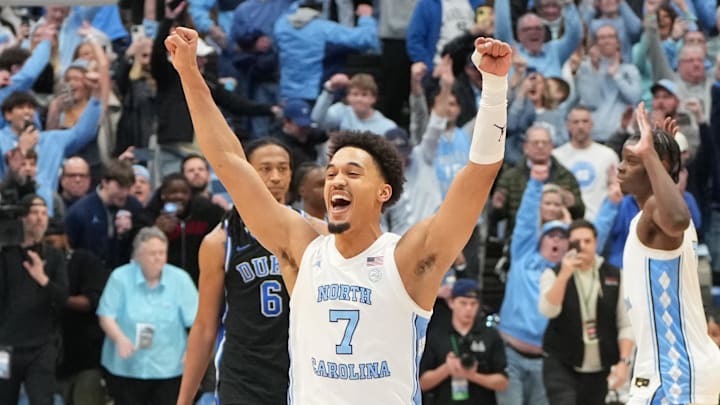 North Carolina guard Seth Trimble celebrates with teammates after hitting the game-winning triple to beat Duke.