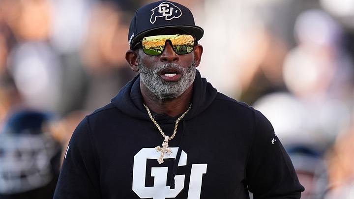 Colorado Buffaloes head coach Deion Sanders runs onto the field before the game against the North Dakota State Bison at Folsom Field. Colorado Buffaloes head coach Deion Sanders runs onto the field before the game against the North Dakota State Bison at Folsom Field.