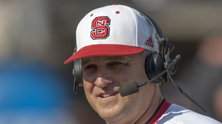 Jun 8, 2013; Raleigh, NC, USA; North Carolina State Wolfpack head coach Elliott Avent talks during a interview between innings in the game against the Rice Owls in the game against the Rice Owls in the Raleigh super regional of the 2013 NCAA baseball tournament at Doak Field. North Carolina State defeated Rice 4-3. Mandatory Credit: Jeremy Brevard-Imagn Images