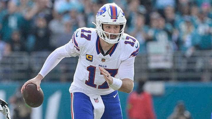 Buffalo Bills quarterback Josh Allen (17) runs with the ball during the first half against the Jacksonville Jaguars in an AFC Wild Card Round game.