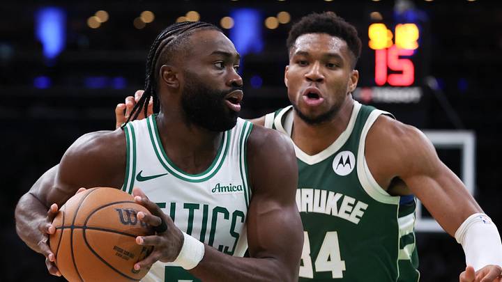 Oct 28, 2024; Boston, Massachusetts, USA; Boston Celtics forward Jaylen Brown (7) drives to the basket defended by Milwaukee Bucks forward Giannis Antetokounmpo (34) during the second half at TD Garden. Mandatory Credit: Paul Rutherford-Imagn Images