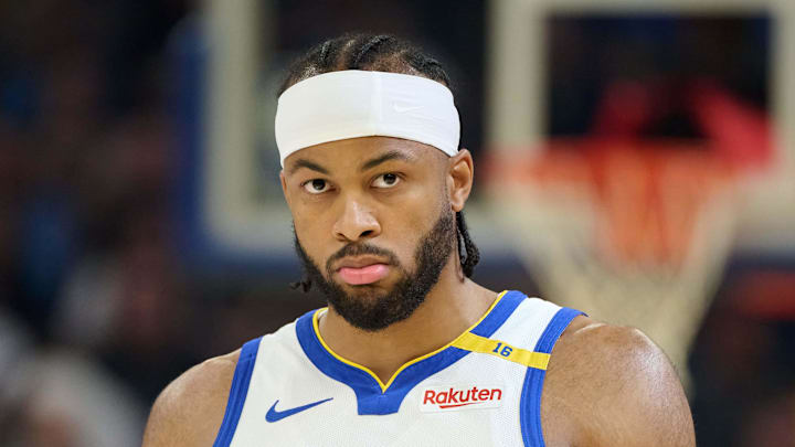 Apr 13, 2025; San Francisco, California, USA; Golden State Warriors guard Moses Moody (4) walks on the court before the start of the first quarter against the LA Clippers at Chase Center. Mandatory Credit: Robert Edwards-Imagn Images