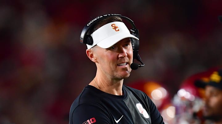 Sep 20, 2025; Los Angeles, California, USA; Southern California Trojans head coach Lincoln Riley speaks with the official during the second half at the Los Angeles Memorial Coliseum. Mandatory Credit: Gary A. Vasquez-Imagn Images