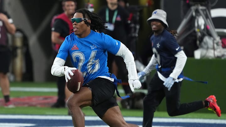 NFC running back Jahmyr Gibbs of the Detroit Lions (26) carries the ball during the 2025 Pro Bowl Games 