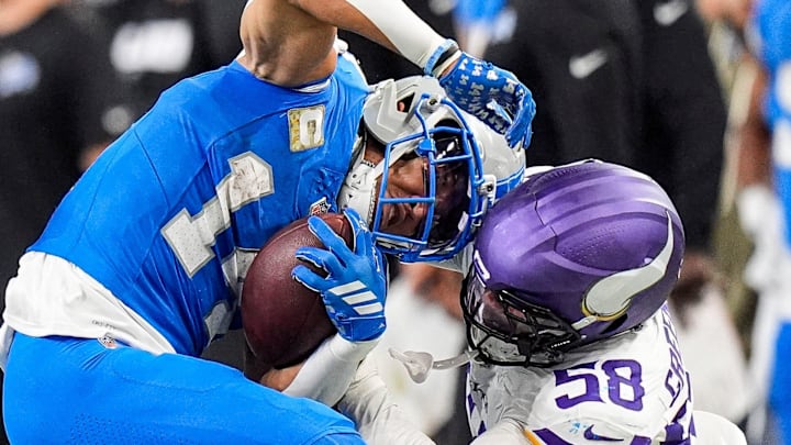 Detroit Lions wide receiver Amon-Ra St. Brown (14).