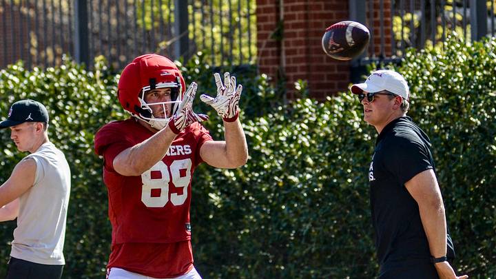 Oklahoma tight end Hayden Hansen prepares to catch a pass during practice. Oklahoma tight end Hayden Hansen prepares to catch a pass during practice.