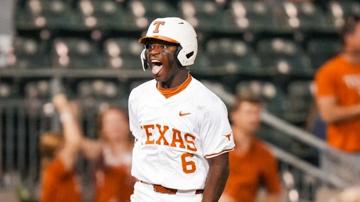 Texas Longhorns' outfielder Anthony Pack Jr. celebrates a grand slam against the USC Upstate Spartans.