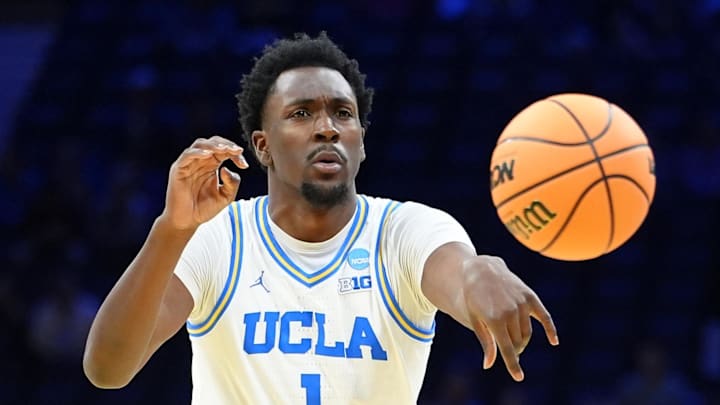 Mar 20, 2026; Philadelphia, PA, USA; UCLA Bruins center Xavier Booker (1) makes a pass against the UCF Knights in the first half during a first round game of the men's 2026 NCAA Tournament at Xfinity Mobile Arena. Mandatory Credit: Kyle Ross-Imagn Images