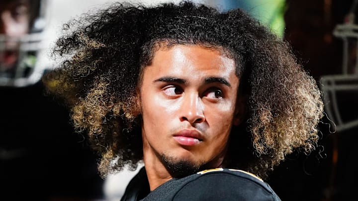 Oct 20, 2023; Carrollton, GA, USA; Carrollton Trojans quarterback Julian Lewis (10) watches on from the sidelines against the Westlake Lions during the first half at Grisham Stadium. The 15-year-old Carrollton High student has already committed to playing for the University of Southern California Trojans and has been considered one of the top high school quarterback prospects. Mandatory Credit: John David Mercer-Imagn Images Oct 20, 2023; Carrollton, GA, USA; Carrollton Trojans quarterback Julian Lewis (10) watches on from the sidelines against the Westlake Lions during the first half at Grisham Stadium. The 15-year-old Carrollton High student has already committed to playing for the University of Southern California Trojans and has been considered one of the top high school quarterback prospects. Mandatory Credit: John David Mercer-Imagn Images