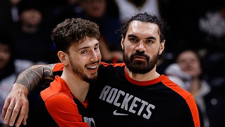 Jan 15, 2025; Denver, Colorado, USA; Houston Rockets center Alperen Sengun (28) and center Steven Adams (12) look on in the fourth quarter against the Denver Nuggets at Ball Arena. Mandatory Credit: Isaiah J. Downing-Imagn Images