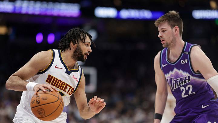 Apr 1, 2026; Salt Lake City, Utah, USA; Denver Nuggets guard Jamal Murray (27) protects the ball from Utah Jazz center Kyle Filipowski (22) during the second half at Delta Center. Mandatory Credit: Chris Nicoll-Imagn Images Apr 1, 2026; Salt Lake City, Utah, USA; Denver Nuggets guard Jamal Murray (27) protects the ball from Utah Jazz center Kyle Filipowski (22) during the second half at Delta Center. Mandatory Credit: Chris Nicoll-Imagn Images