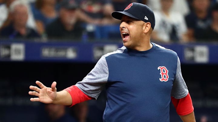 Boston Red Sox manager Alex Cora (20) reacts during the seventh inning against the Tampa Bay Rays at Tropicana Field.
