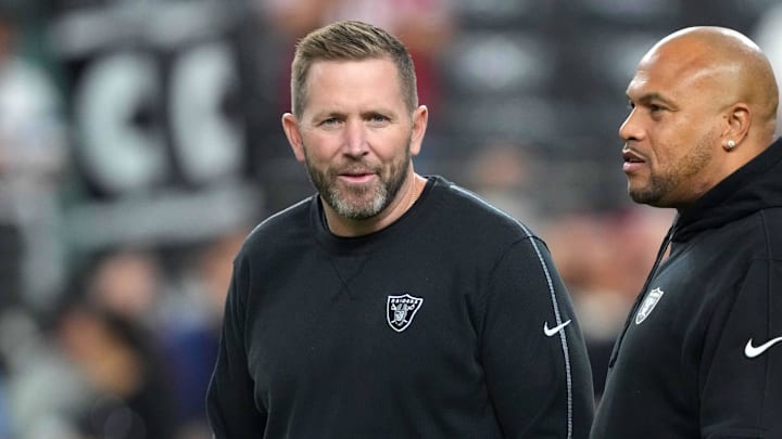 Aug 23, 2024; Paradise, Nevada, USA; Las Vegas Raiders coach Antonio Pierce (right) and pass game coordinator Scott Turner during the San Francisco 49ers in the first half at Allegiant Stadium. Mandatory Credit: Kirby Lee-Imagn Images