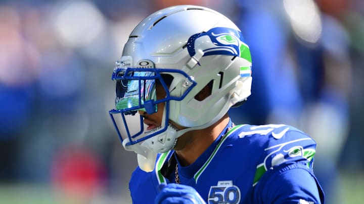 Oct 5, 2025; Seattle, Washington, USA; Seattle Seahawks wide receiver Jaxon Smith-Njigba (11) wearing the Seahawks throw back helmet prior to a game against the Tampa Bay Buccaneers at Lumen Field. Mandatory Credit: Steven Bisig-Imagn Images