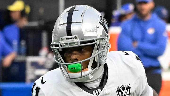 Oct 20, 2024; Inglewood, California, USA; Las Vegas Raiders wide receiver Tre Tucker (11) heads down the field after catching a short pass during the fourth quarter against the Los Angeles Rams at SoFi Stadium. Mandatory Credit: Robert Hanashiro-Imagn Images