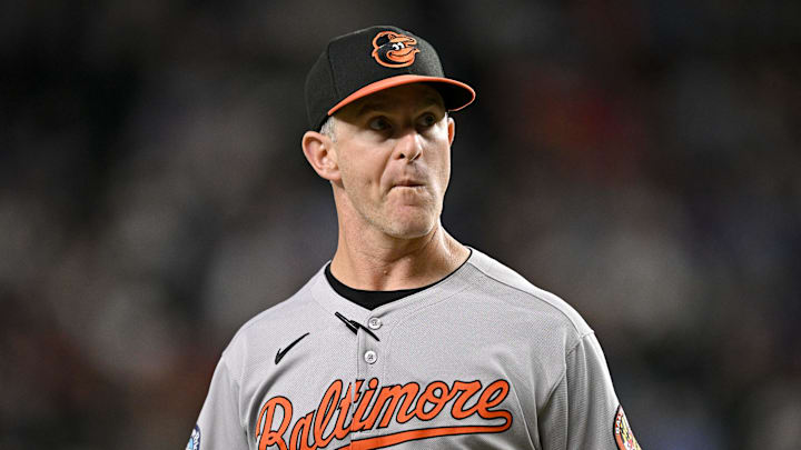 Jul 2, 2025; Arlington, Texas, USA; Baltimore Orioles interim manager Tony Mansolino (36) walks back to the dugout during the fifth inning against the Texas Rangers at Globe Life Field. Mandatory Credit: Jerome Miron-Imagn Images Jul 2, 2025; Arlington, Texas, USA; Baltimore Orioles interim manager Tony Mansolino (36) walks back to the dugout during the fifth inning against the Texas Rangers at Globe Life Field. Mandatory Credit: Jerome Miron-Imagn Images