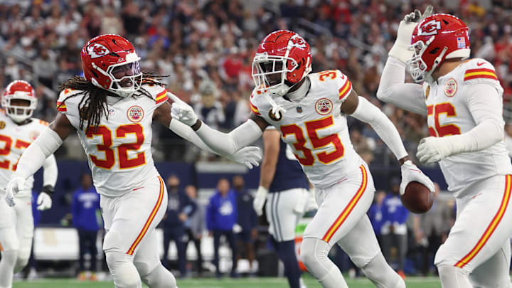 Nov 27, 2025; Arlington, Texas, USA; Kansas City Chiefs linebacker Nick Bolton (32) and Kansas City Chiefs cornerback Jaylen Watson (35) celebrate after an interception against the Dallas Cowboys during the first quarter at AT&T Stadium. Mandatory Credit: Kevin Jairaj-Imagn Images