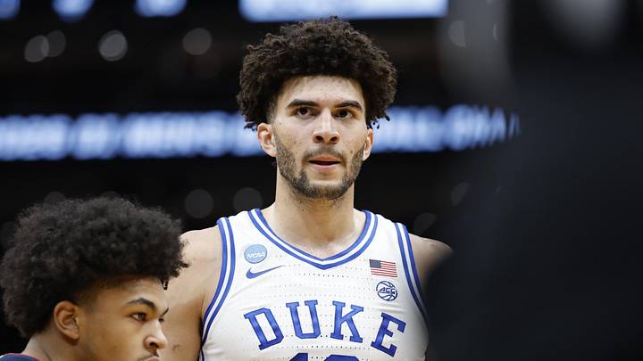 Mar 29, 2026; Washington, DC, USA; Duke Blue Devils forward Cameron Boozer (12) waits for the ball to be thrown into play as UConn Huskies forward Jaylin Stewart (3) defends in the first half during an Elite Eight game of the East Regional of the men's 2026 NCAA Tournament at Capital One Arena. Mandatory Credit: Amber Searls-Imagn Images Mar 29, 2026; Washington, DC, USA; Duke Blue Devils forward Cameron Boozer (12) waits for the ball to be thrown into play as UConn Huskies forward Jaylin Stewart (3) defends in the first half during an Elite Eight game of the East Regional of the men's 2026 NCAA Tournament at Capital One Arena. Mandatory Credit: Amber Searls-Imagn Images