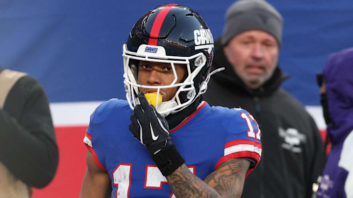 Dec 14, 2025; East Rutherford, New Jersey, USA;  Wide receiver Wan'Dale Robinson (17) celebrates touchdown during the fourth quarter against the Washington Commanders at MetLife Stadium. 