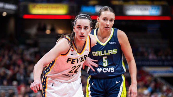 Indiana Fever guard Caitlin Clark (22) and Dallas Wings guard Paige Bueckers (5)