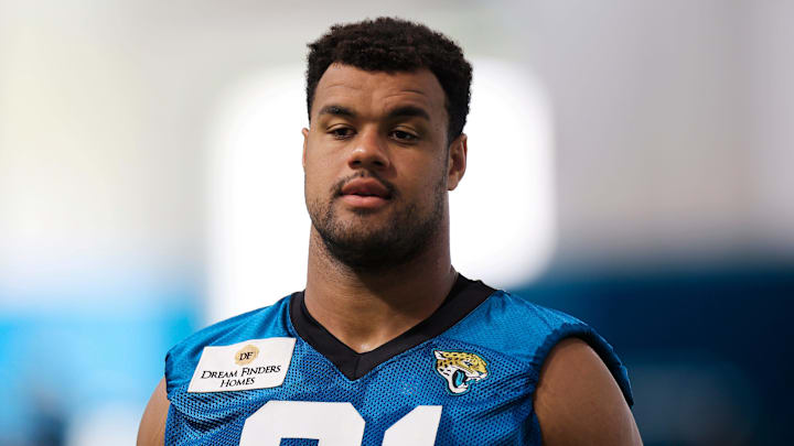 Jacksonville Jaguars defensive lineman Arik Armstead (91) walks to be interviewed after a combined NFL football training camp session between the Tampa Bay Buccaneers and Jacksonville Jaguars Wednesday, Aug. 14, 2024 at EverBank Stadium’s Miller Electric Center in Jacksonville, Fla. [Corey Perrine/Florida Times-Union]