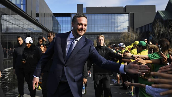 Oct 26, 2024; Eugene, Oregon, USA; Oregon Ducks head coach Dan Lanning greets fans before a game against the Illinois Fighting Illini at Autzen Stadium. Mandatory Credit: Troy Wayrynen-Imagn Images