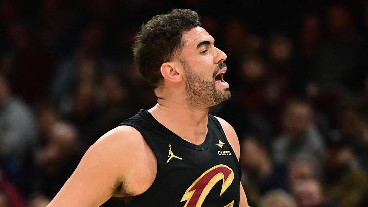 Dec 21, 2024; Cleveland, Ohio, USA; Cleveland Cavaliers forward Georges Niang (20) reacts to the players on the Philadelphia 76ers bench during the first half at Rocket Mortgage FieldHouse. Mandatory Credit: Ken Blaze-Imagn Images Dec 21, 2024; Cleveland, Ohio, USA; Cleveland Cavaliers forward Georges Niang (20) reacts to the players on the Philadelphia 76ers bench during the first half at Rocket Mortgage FieldHouse. Mandatory Credit: Ken Blaze-Imagn Images