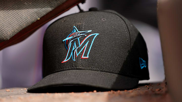 Apr 11, 2019; Cincinnati, OH, USA; A view of a New Era Miami Marlins hat in the dugout during the game against the Cincinnati Reds at Great American Ball Park. Mandatory Credit: Aaron Doster-Imagn Images