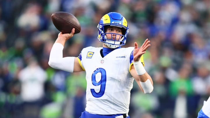 Jan 25, 2026; Seattle, WA, USA; Los Angeles Rams quarterback Matthew Stafford (9) passes against the Seattle Seahawks during the first half in the 2026 NFC Championship Game at Lumen Field. Mandatory Credit: Kevin Ng-Imagn Images