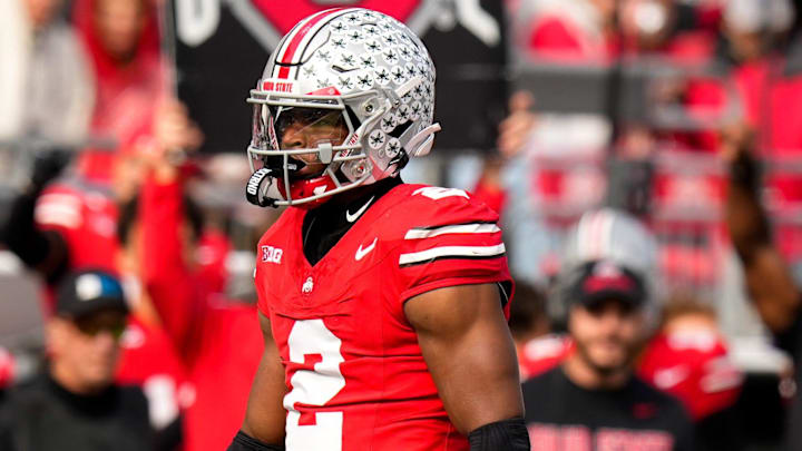 Ohio State Buckeyes defensive back Caleb Downs reacts in the first half of the college football game at Ohio Stadium.