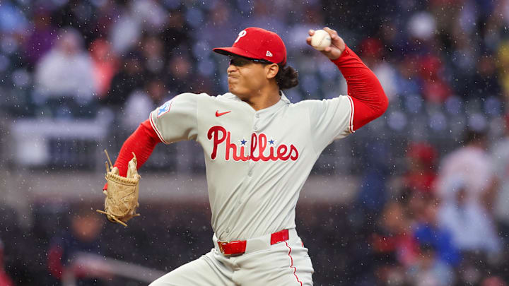 Apr 10, 2025; Atlanta, Georgia, USA; Philadelphia Phillies starting pitcher Jesus Luzardo (44) throws in a light rain against the Atlanta Braves in the second inning at Truist Park. 