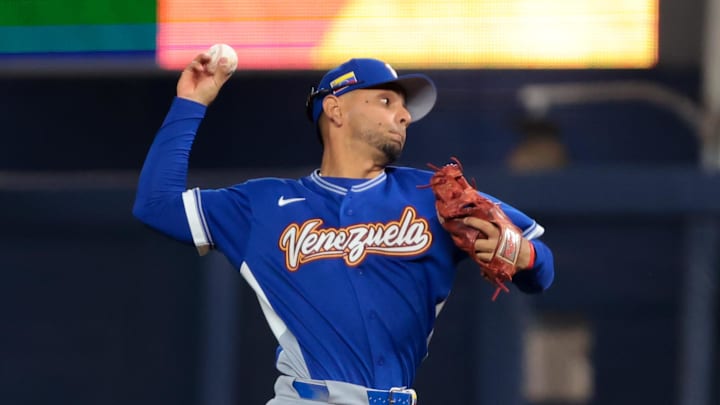 Mar 9, 2026; Miami, FL, United States; Venezuela shortstop Andres Gimenez (0) throws to first base to retire Nicaragua left fielder Chase Dawson (not pictured) during the sixth inning at loanDepot Park. Mandatory Credit: Sam Navarro-Imagn Images