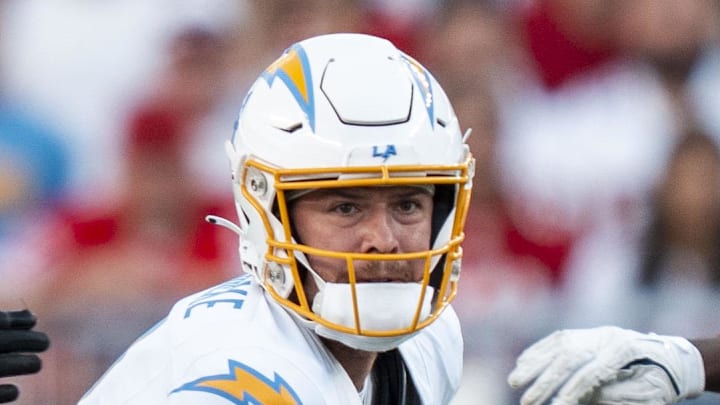 Former Chargers quarterback Taylor Heinicke (4) runs with the football against the San Francisco 49ers 