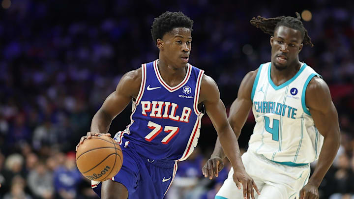 Oct 25, 2025; Philadelphia, Pennsylvania, USA; Philadelphia 76ers guard VJ Edgecombe (77) dribbles the ball past Charlotte Hornets guard Sion James (4) during the second quarter at Xfinity Mobile Arena. Mandatory Credit: Bill Streicher-Imagn Images Oct 25, 2025; Philadelphia, Pennsylvania, USA; Philadelphia 76ers guard VJ Edgecombe (77) dribbles the ball past Charlotte Hornets guard Sion James (4) during the second quarter at Xfinity Mobile Arena. Mandatory Credit: Bill Streicher-Imagn Images