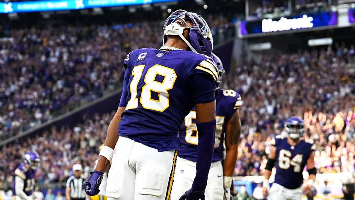 Minnesota Vikings wide receiver Justin Jefferson (18) celebrates after a touchdown during the second half against the Green Bay Packers at U.S. Bank Stadium. Mandatory Credit: Jeffrey Becker-Imagn Images Minnesota Vikings wide receiver Justin Jefferson (18) celebrates after a touchdown during the second half against the Green Bay Packers at U.S. Bank Stadium. Mandatory Credit: Jeffrey Becker-Imagn Images