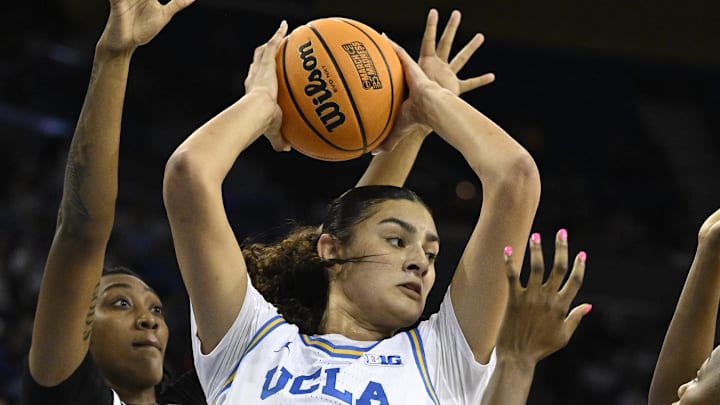Nov 24, 2024; Los Angeles, California, USA;  South Carolina Gamecocks forward Ashlyn Watkins (2) and forward Joyce Edwards (8) trap UCLA Bruins center Lauren Betts (51) during the third quarter at Pauley Pavilion presented by Wescom. Mandatory Credit: Robert Hanashiro-Imagn Images