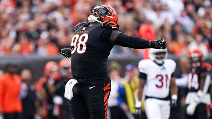 Cincinnati Bengals defensive tackle T.J. Slaton Jr. (98) reacts after a sack in the third quarter of a NFL game between the Cincinnati Bengals and Arizona Cardinals, Sunday, Dec. 28, 2025, at Paycor Stadium in downtown Cincinnati. Bengals won 37-14.