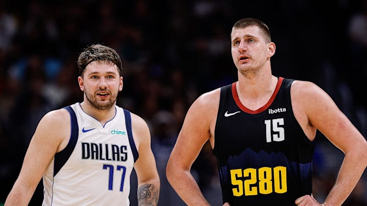 Dallas Mavericks guard Luka Doncic and Denver Nuggets center Nikola Jokic in the second quarter at Ball Arena. Mandatory Credit: Isaiah J. Downing-Imagn Images