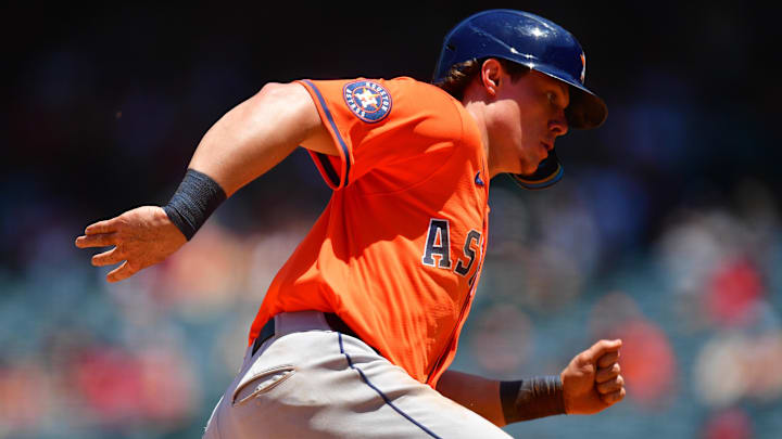  Houston Astros center fielder Jake Meyers (6) runs home to score against the Los Angeles Angels during the fifth inning at Angel Stadium.