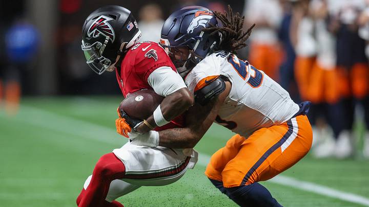Atlanta Falcons wide receiver Keelan Marion (85) is tackled by Denver Broncos linebacker Red Murdock (50). Atlanta Falcons wide receiver Keelan Marion (85) is tackled by Denver Broncos linebacker Red Murdock (50).